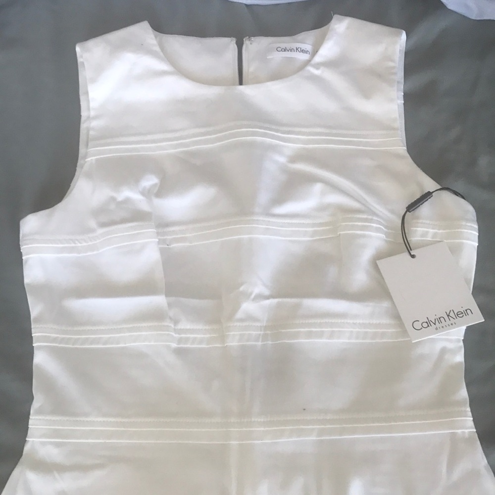 White knee length dress